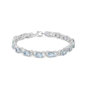 .925 Sterling Silver 16.0 Cttw Oval Blue Topaz and Diamond Accent Tennis X Link Bracelet (I-J Color, I1-I2 Clarity) - Size 7" Inch