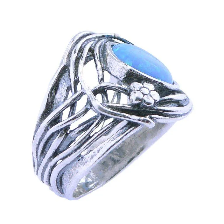 Bluenoemi sterling silver ring for woman. Israel ring. Set with a blue lab opal stone.