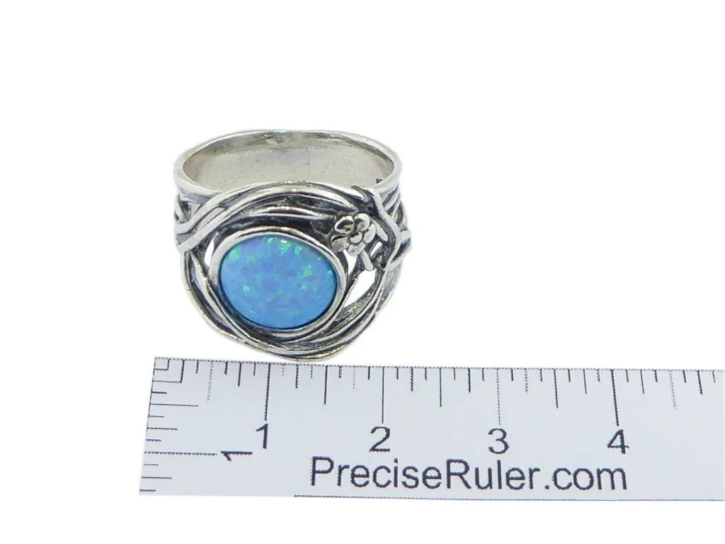 Bluenoemi sterling silver ring for woman. Israel ring. Set with a blue lab opal stone.